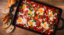 <p>Shakshuka is by far the easiest way to impress your guests at brunch. It's mildly spicy, full of flavour, and has perfectly runny eggs. The rich tomato sauce will balance those delicious <a href="https://www.delish.com/uk/cooking/recipes/a29245017/banana-pancake-dippers-recipe/" rel="nofollow noopener" target="_blank" data-ylk="slk:Banana Pancakes;elm:context_link;itc:0;sec:content-canvas" class="link ">Banana Pancakes</a> you're whipping up too. </p><p>Get the <a href="https://www.delish.com/uk/cooking/recipes/a29949777/shakshuka-with-feta-and-parsley-recipe/" rel="nofollow noopener" target="_blank" data-ylk="slk:Shakshuka;elm:context_link;itc:0;sec:content-canvas" class="link ">Shakshuka</a> recipe.</p>