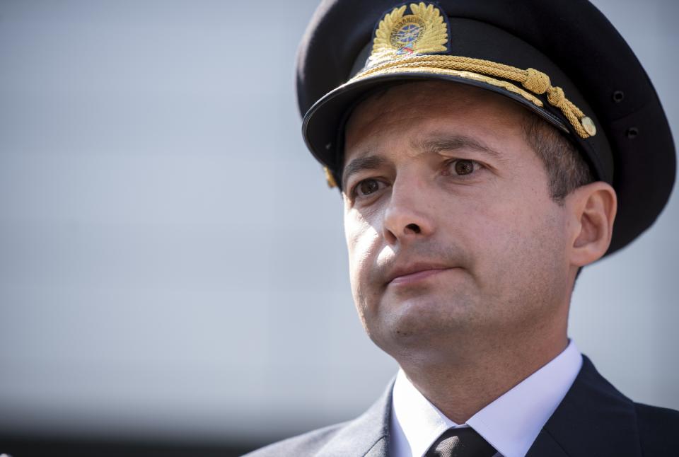 Damir Yusupov, 41-year-old Russian pilot, speaks to the media in Yekaterinburg, Russia, Friday, Aug. 16, 2019. A Russian pilot who managed to smoothly land his disabled plane in a corn field after birds hit both engines said Friday that a quick landing was his only chance and he was not afraid of handling it. (AP Photo)