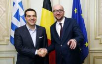 Belgian Prime Minister Charles Michel poses with his Greek counterpart Alexis Tsipras (L) ahead of a meeting in Brussels February 12, 2015. REUTERS/Francois Lenoir