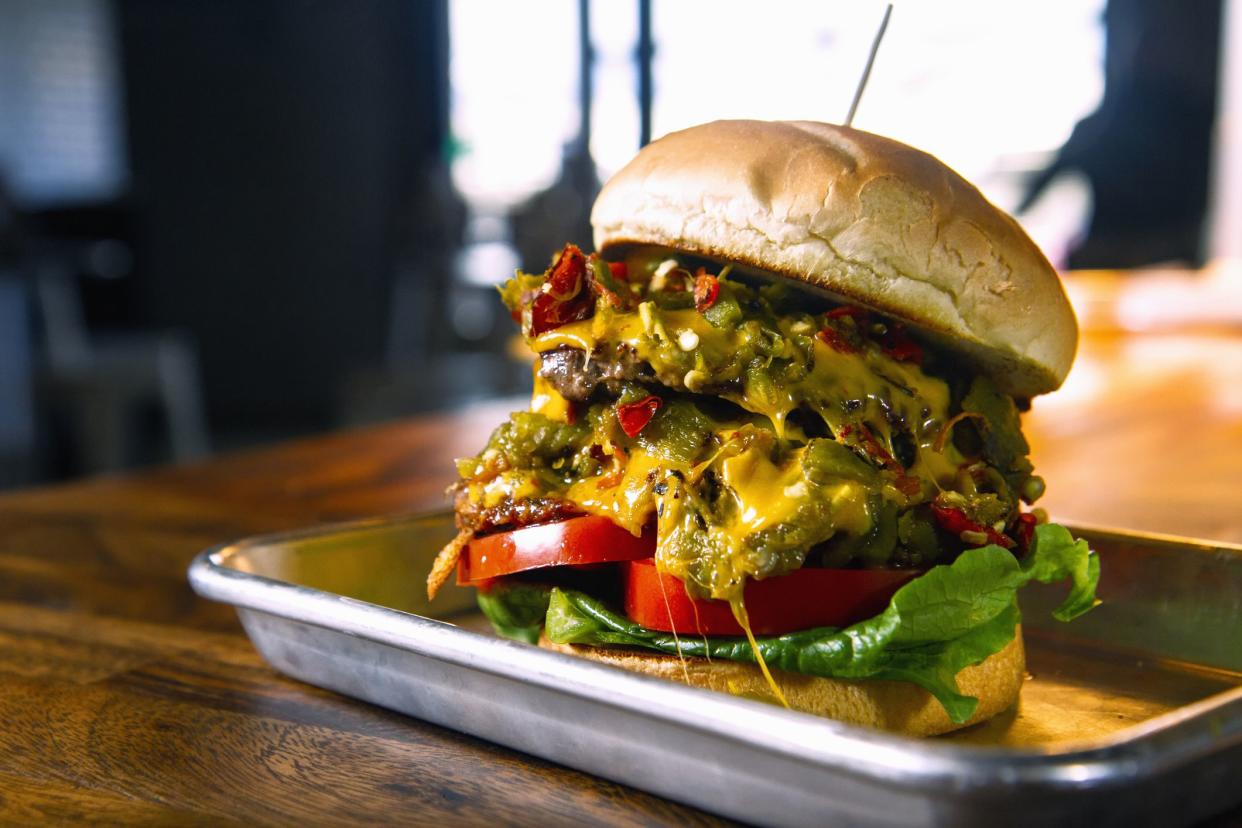 A fresh hot Green Chile Cheeseburger