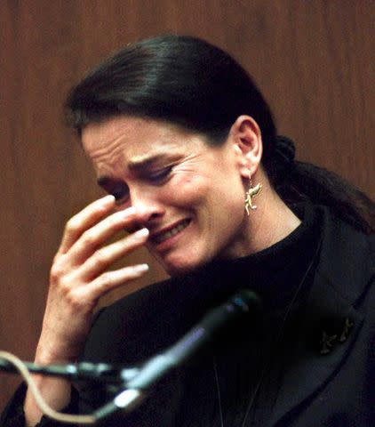 <p>Ken LUBAS/AFP/Getty </p> Denise Brown testified about O.J. Simpson's violent behavior on Feb. 6, 1995.