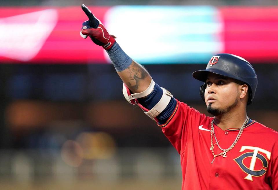 Minnesota Twins’ Luis Arraez points to the dugout after hitting a single against the Kansas City Royals during the second inning of a baseball game, Tuesday, Sept. 13, 2022, in Minneapolis. On Friday, Jan. 20, 2023, the Twins traded reigning AL batting champion Arraez to the Miami Marlins for a three-player package featuring starting pitcher Pablo López.