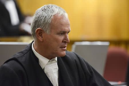 Defence lawyer Barry Roux reacts to the sentencing of South African Olympic and Paralympic track star Oscar Pistorius at the North Gauteng High Court in Pretoria October 21, 2014. REUTERS/Herman Verwey/Pool