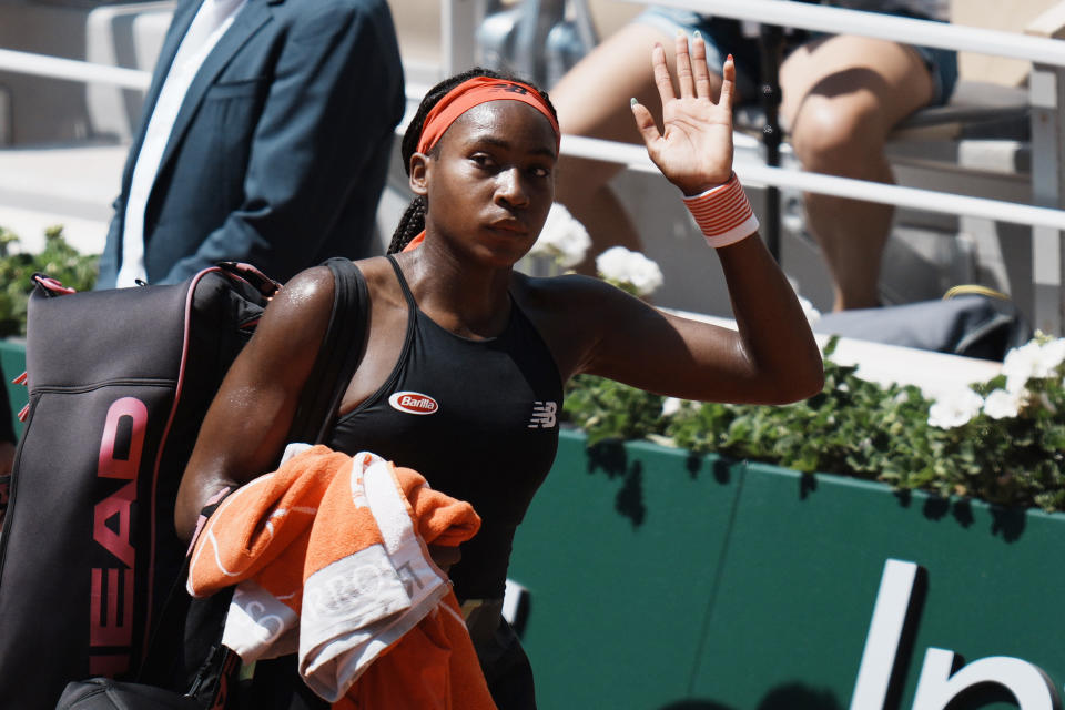 United States's Coco Gauff leaves the court after losing to Czech Republic's Barbora Krejcikova in their quarterfinal match of the French Open tennis tournament at the Roland Garros stadium Wednesday, June 9, 2021 in Paris. Krejcikova won 7-6, 6-3. (AP Photo/Thibault Camus)