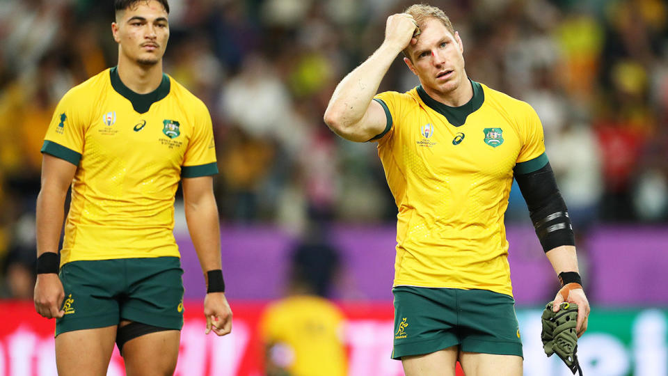 Wallabies players, pictured here leaving the field after their loss at the Rugby World Cup.