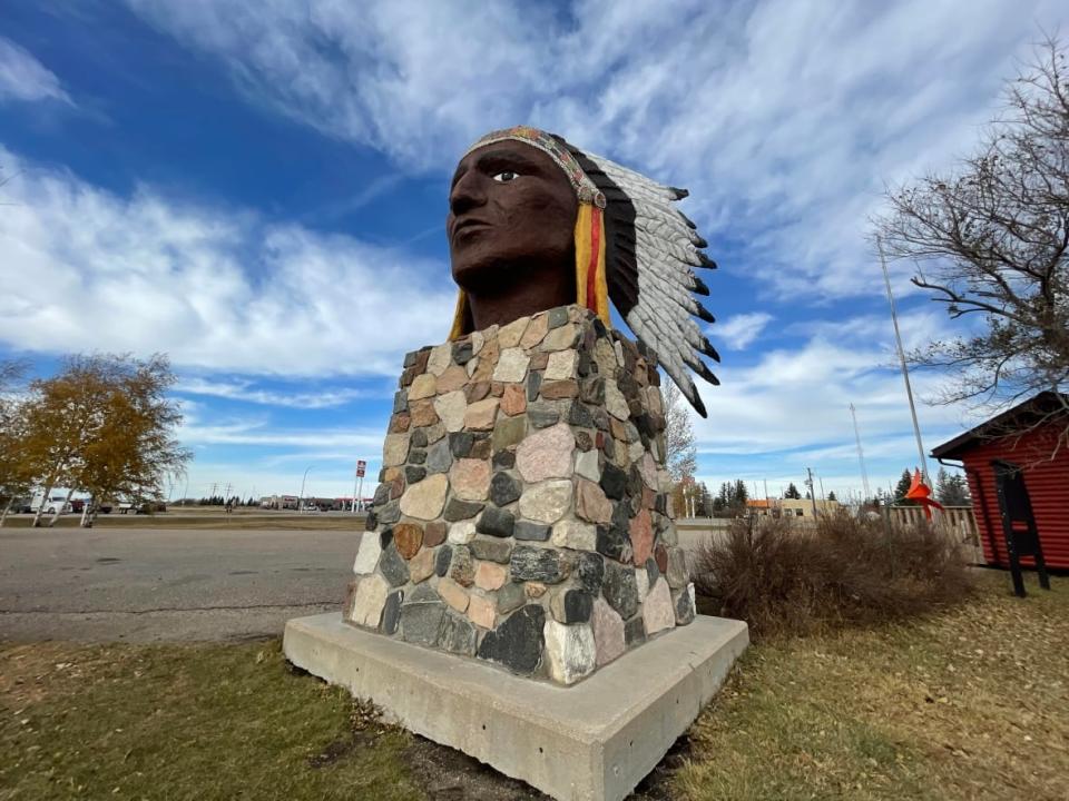 A large monument of an 'Indian Head' greets all who pass or enter the small Saskatchewan town.  (Laura Sciarpelletti/CBC - image credit)
