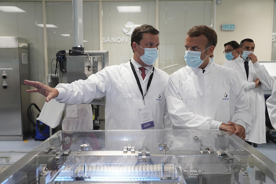 French President Emmanuel Macron visits a Sanofi plant in France in June.