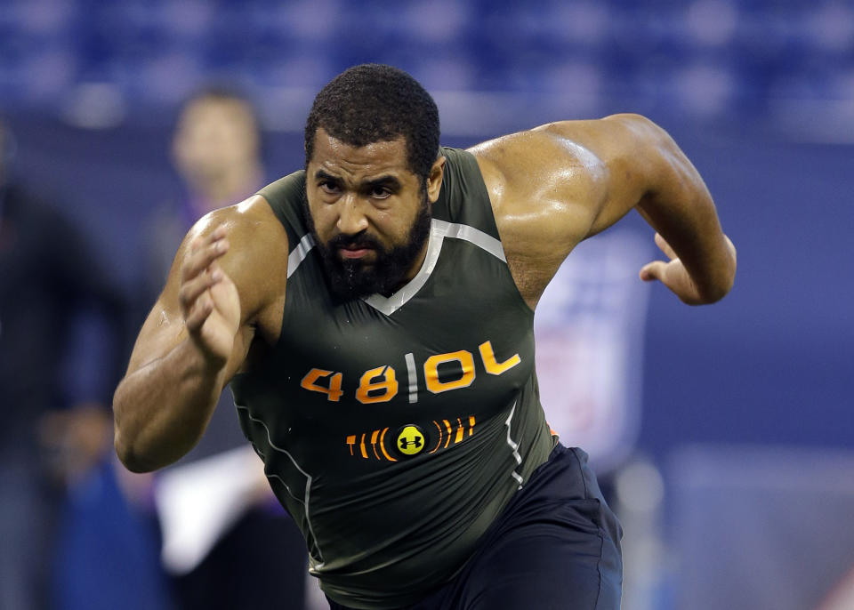 FILE - In this Feb. 22, 2014, file photo, Penn State offensive lineman John Urschel runs a drill at the NFL football scouting combine in Indianapolis. Urschel will routinely provide a look at his journey leading to the NFL draft on May 8 in a series of diary entries. (AP Photo/Michael Conroy, File)