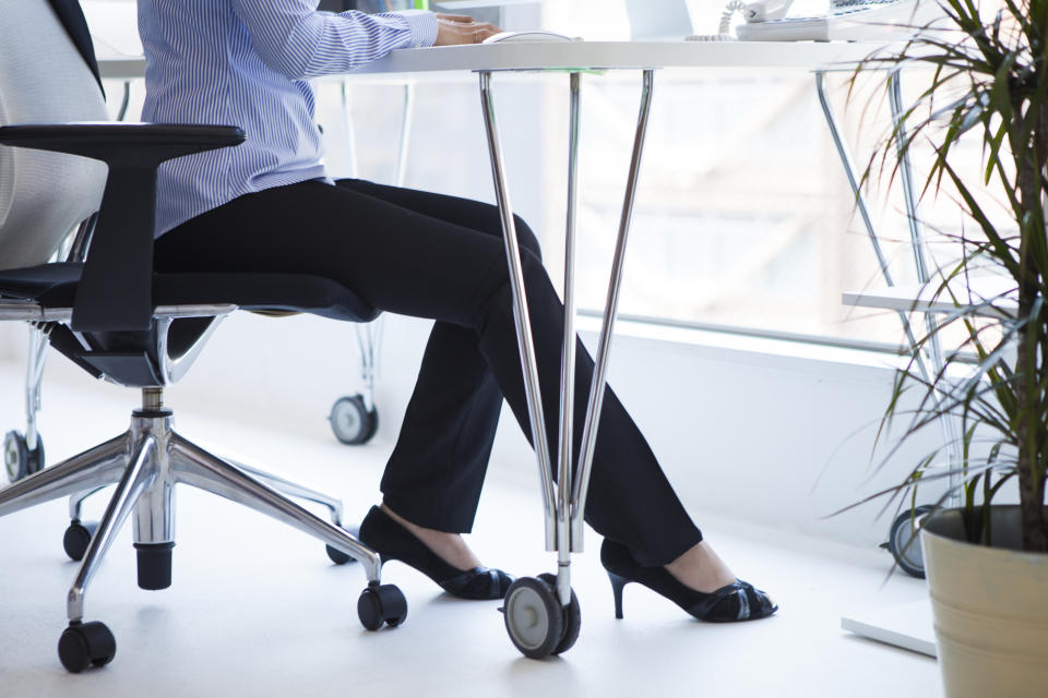 Feet of the women working in the office