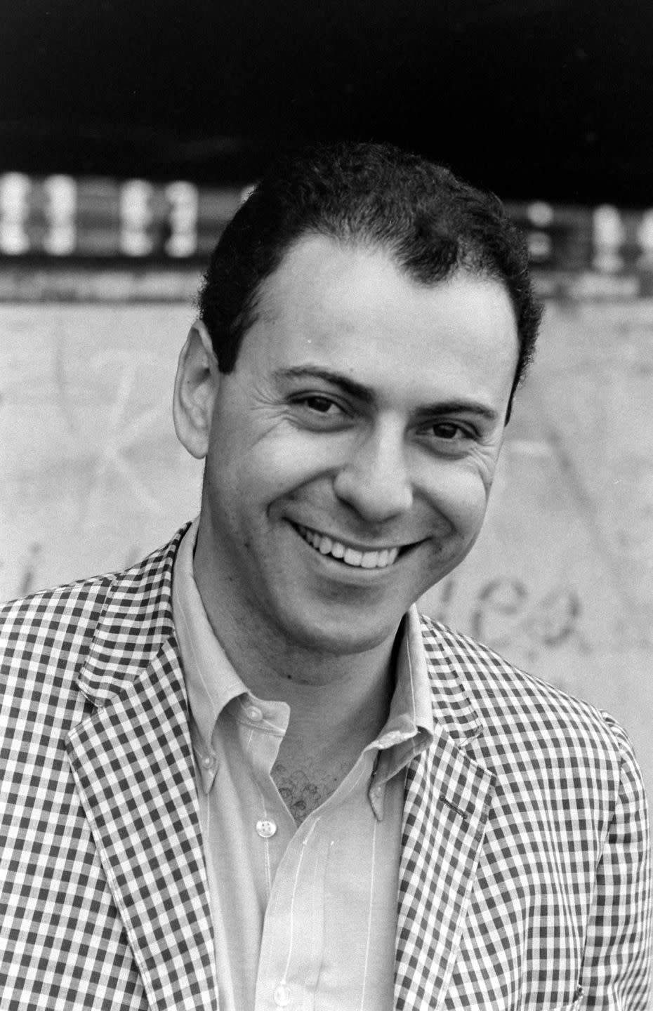 <p>Before he was an Academy Award winner, Alan Arkin rocked short black hair. As a young actor, this head of hair helped earn him roles in films, like <em>Catch-22</em><em>. </em></p>