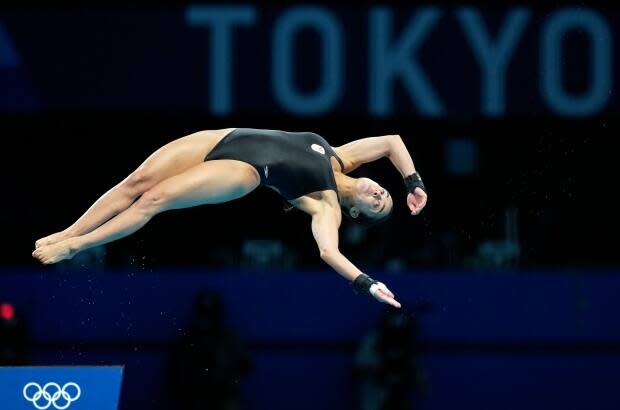 Canada's Meaghan Benfeito failed to advance to the final of the women's 10-metre platform diving event at Tokyo 2020, finishing just one spot away from qualifying. (Dmitri Lovetsky/The Associated Press - image credit)