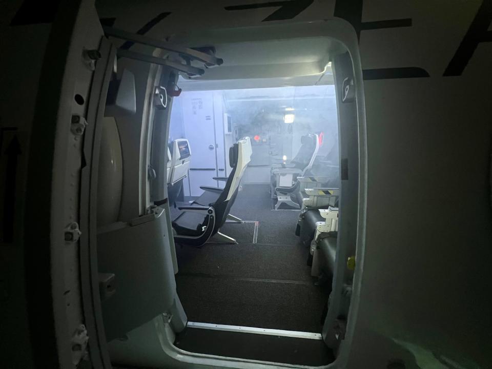 Smoke filled the A320 mock cabin — Air New Zealand's Academy of Learning in Auckland.