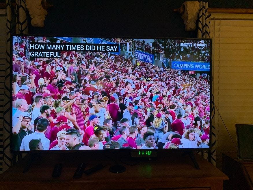 FSU Fans shown after a stunning victory over LSU and an interview with a grateful quarterback, Jordan Travis.