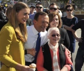 Ladies man: Tony Abbott and daughter Frances campaigning in Brisbane. Picture: Twitter