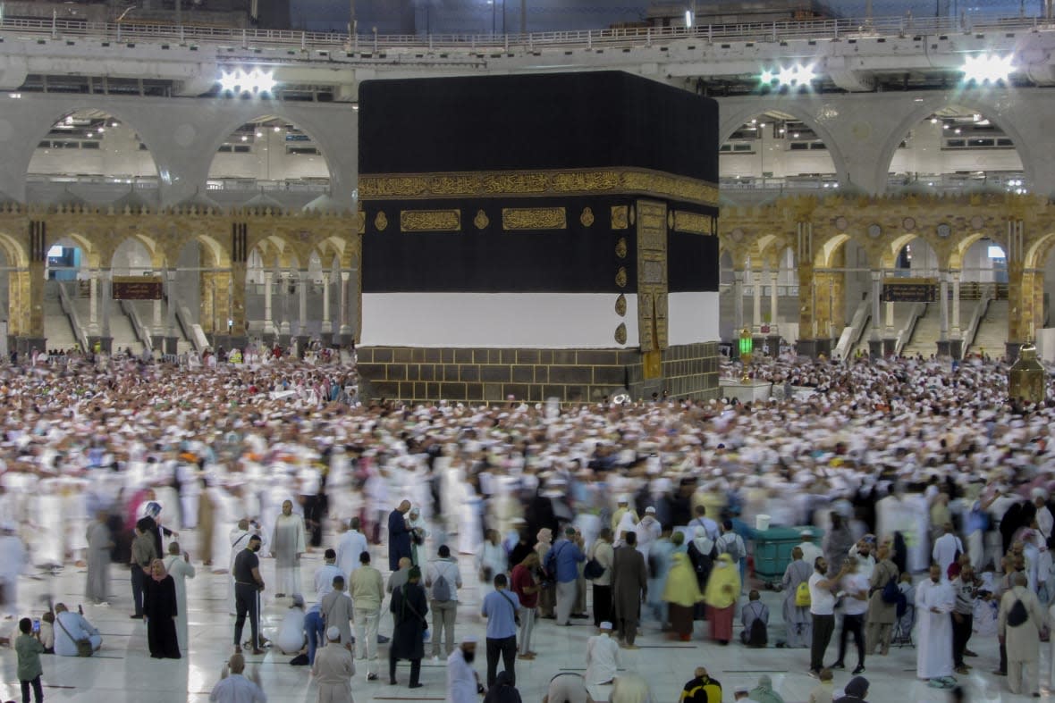 Muslim pilgrims circumambulate around the Kaaba, the cubic structure at the Grand Mosque, during the annual hajj pilgrimage, in Mecca, Saudi Arabia, Saturday, June 24, 2023. (AP Photo/Amr Nabil)