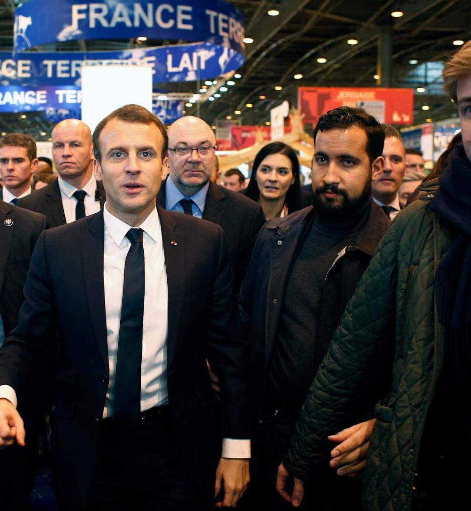 Security staff: Emmanuel Macron and Alexandre Benalla, right (AFP)