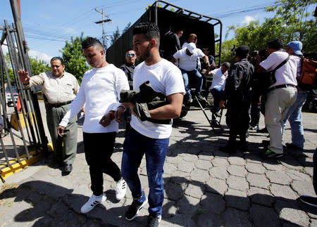 The detainees charged with the murder of indigenous environmental activist Berta Caceres arrive to court for their trial, in Tegucigalpa, Honduras, November 29, 2018. REUTERS/Jorge Cabrera