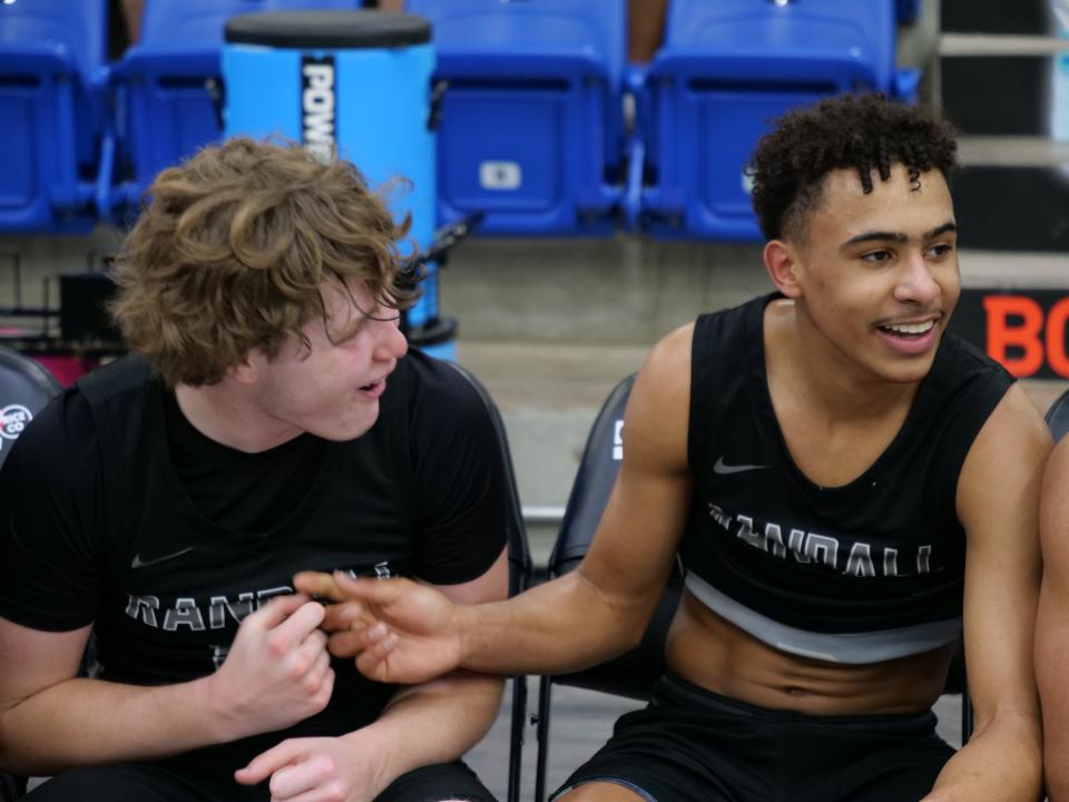 KJ Thomas (right) celebrates with Brody Wilson after Randall defeated Canyon in the 4A regional finals on Saturday, March 4, 2023 at Rip Griffin Center in Lubbock.