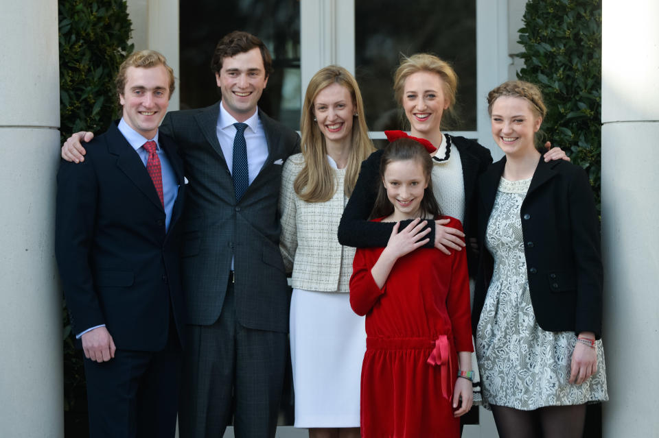 The five children of Princess Astrid, (L-R) Prince Joachim, Prince Amedeo and his fiancee Elisabetta Rosboch von Wolkenstein, Princess Laetitia Maria, Princess Maria Laura and Princess Luisa Maria, pose for a picture on the day of the engagement of Belgian Prince Amedeo (grandson of King Albert II) to Elisabetta Rosboch von Wolkenstein, in the Schonenberg royal residence, home of Amedeo's parents, in Brussels, on February 15, 2014. 27 years old Prince Amedeo and Italian journalist Elisabetta Rosboch von Wolkenstein live in New-York. AFP PHTO / BELGA PHOTO / FREDERIC SIERAKOWSKI == BELGIUM OUT==        (Photo credit should read FREDERIC SIERAKOWSKI/AFP via Getty Images)