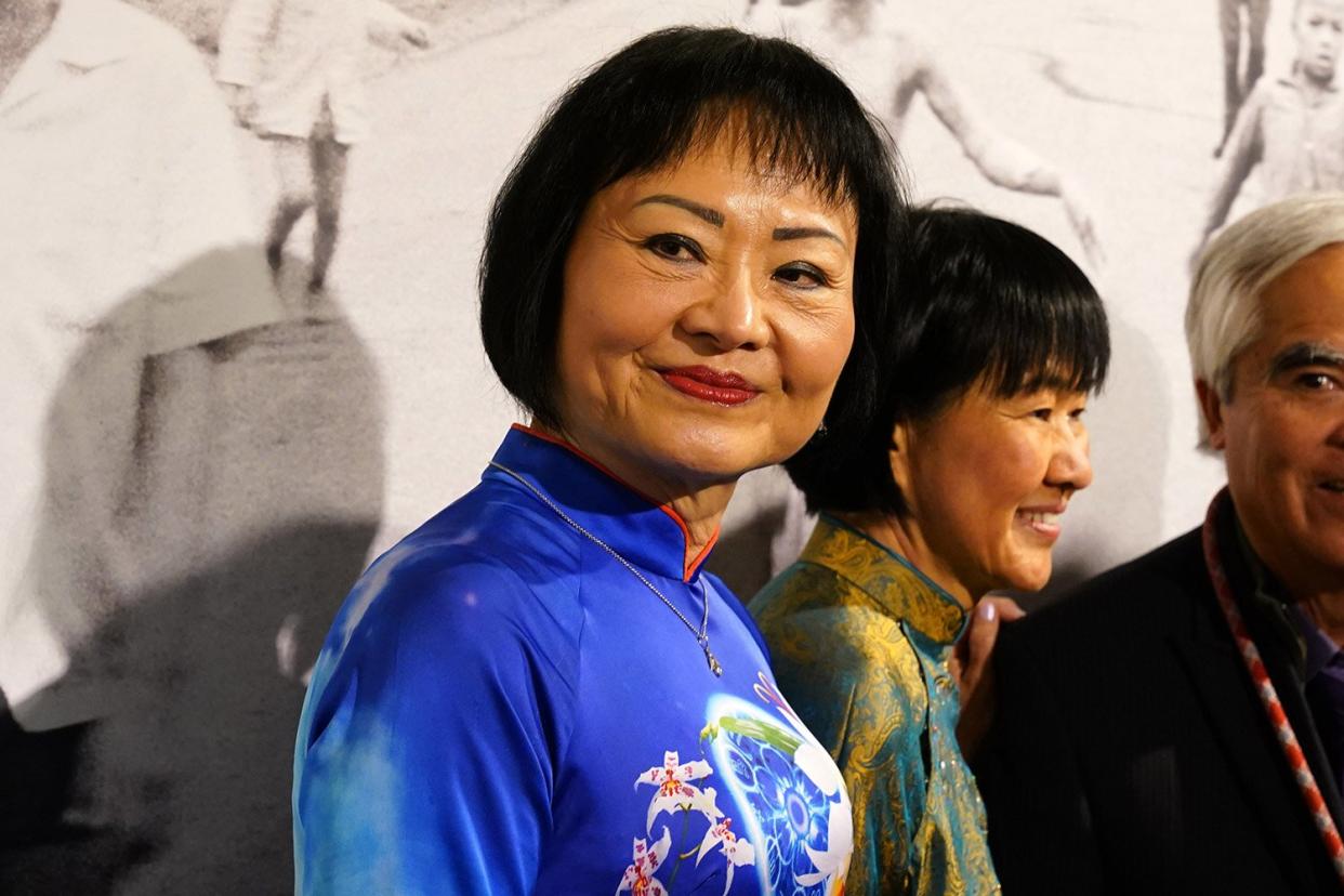 MILAN, ITALY - MAY 05: Kim Phuc and Nick Ut attend the Press Preview of the Exhibition "From Hell to Hollywood" at Palazzo Lombardia on May 05, 2022 in Milan, Italy. (Photo by Pier Marco Tacca/Getty Images)