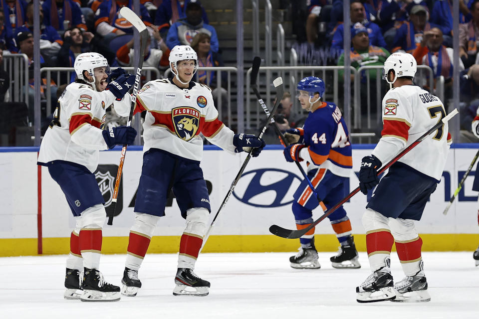 Florida Panthers center Eetu Luostarinen (27) reacts after scoring a goal against the New York Islanders during the second period of an NHL hockey game Thursday, Oct. 13, 2022, in Elmont, N.Y. (AP Photo/Adam Hunger)