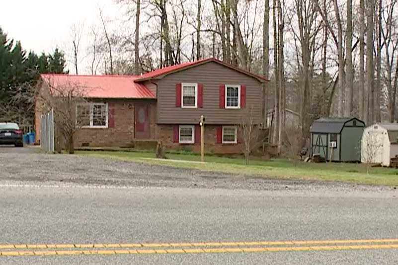 A house and outbuilding, right, where Jorge Camacho is believed to have been living, in Lexington, N.C., on Monday. (WXII)