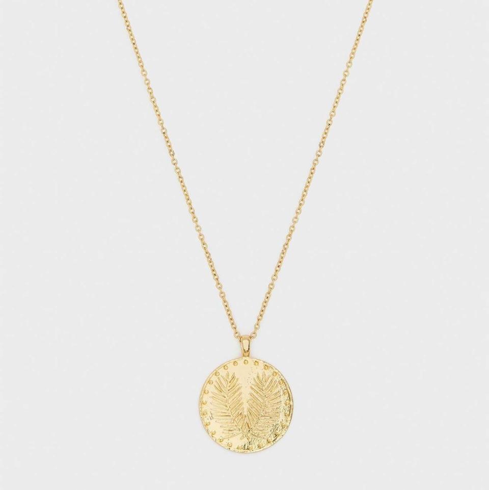 "I love a gold coin necklace. I have a few lying around my jewelry box, but this has become my favorite. It's adjustable so I can customize the length to go with any neckline, which is great when you're traveling a lot in the summer." <strong>&mdash; Danielle Gonzalez (<a href="https://fave.co/2MZQiyJ" target="_blank" rel="noopener noreferrer">Find it for $60 at Gorjana</a>)</strong>