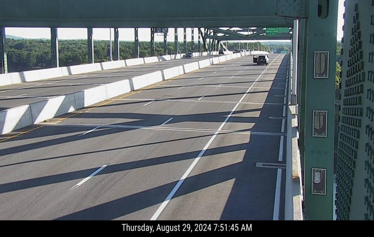 This image from a New Hampshire Department of Transportation webcam shows the Piscataqua River Bridge at 7:51 a.m. Thursday, Aug. 29, 2024, while the bridge was closed to traffic following an incident in which a murder suspect was fatally shot by police, according to authorities.