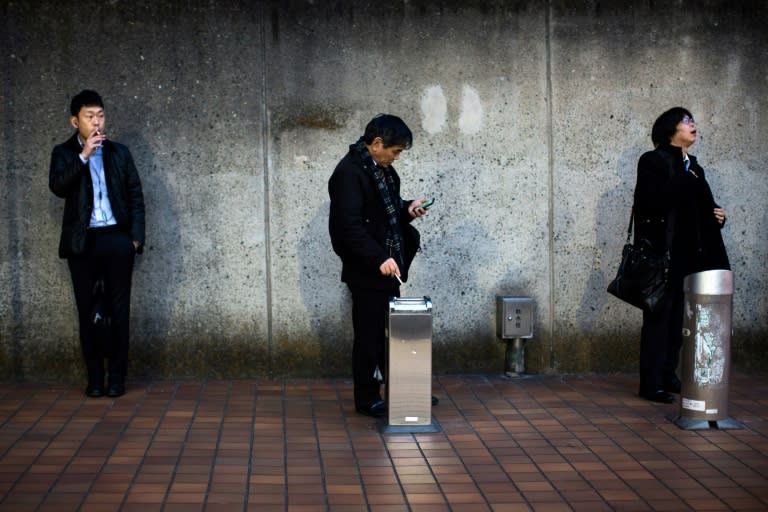 More than 240 Japanese municipalities restrict lighting up on city streets, meaning smokers must get their fix in clearly marked smoking zones