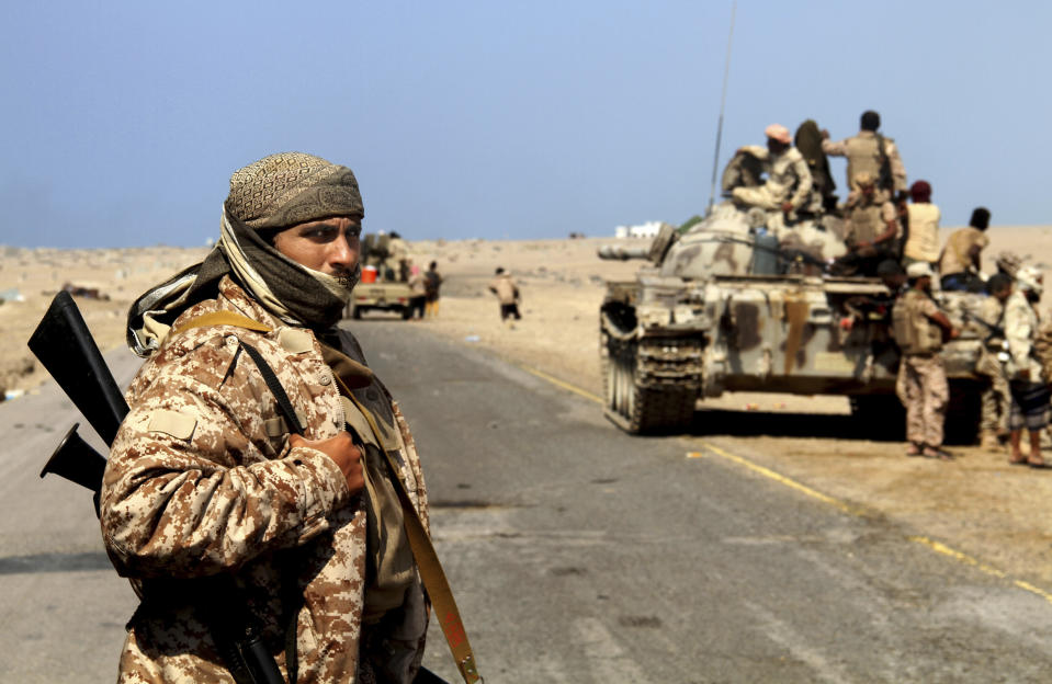 Coalition-backed fighters advance on Yemen’s Red Sea port town of Mocha in this Jan. 11 2017, photo. The coalition forces eventually captured the town from Shiite rebels known as Houthis. Some fighters in the unit were openly al-Qaida, wearing Afghan-style garb and carrying weapons with an al-Qaida logo, a sign of how closely the militants have been involved in the war against the Houthis, who are seen by Saudi Arabia and the United Arab Emirates as a proxy for Iranian influence. (AP Photo)