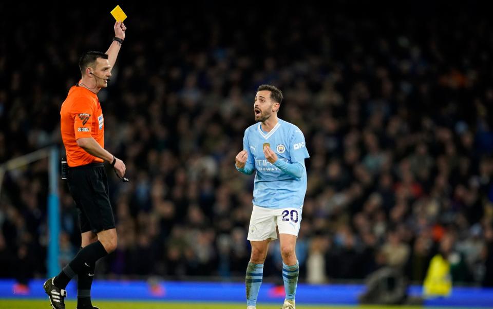 Bernardo Silva receives a yellow card