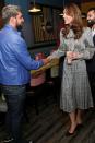 <p>The Duchess of Cambridge meet with Amir Khan during a visit to MyLahore’s flagship restaurant. She wore a Zara dress. </p>