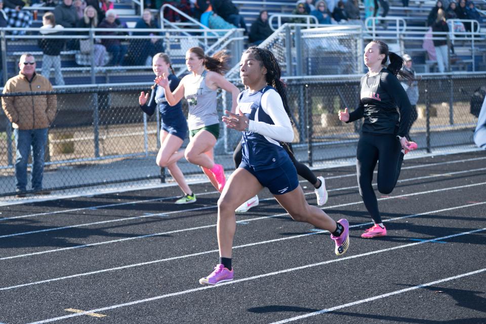 Athletes approach the finish line in the 100 meter dash during the Lakeview Track and Field Invitational at Lakeview High School on Friday, April 5, 2024.