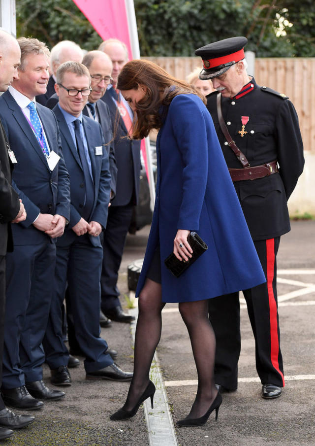 Kate Middleton suffers wardrobe malfunction as her dress was pictured  blowing up around her thighs while she was getting out of a helicopter in  Canada.