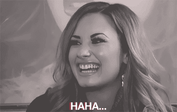 Demi Lovato laughing and then saying, "No."