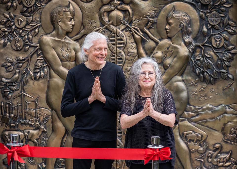 Alex and Allyson Grey in front of Entheon’s doors.