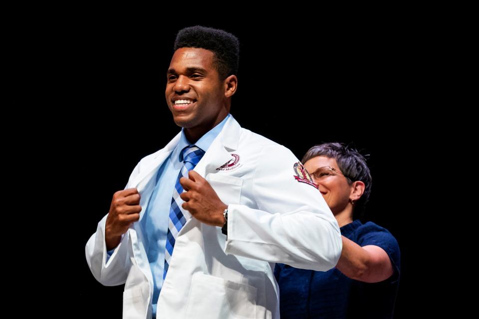 Members of the Florida State University College of Medicine Class of 2023 received white coats Friday, Aug. 9, 2019.