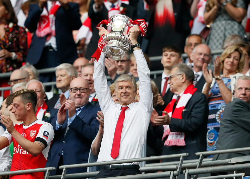 His final big honour: Arsenal lift the 2017 trophy, his seventh FA Cup capture