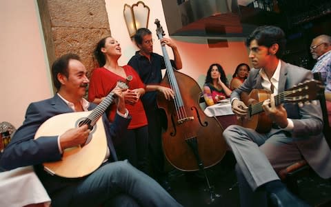 The haunting melodies of Fado music stay with you long after you've left Portugal - Credit: ALAMY