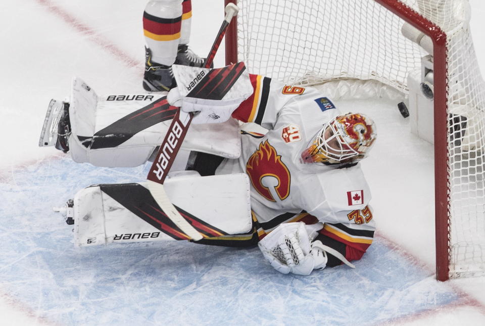 Calgary Flames goaltender Cam Talbot (39) is scored on by the Dallas Stars during the first period of an NHL hockey Stanley Cup first-round playoff series, Thursday, Aug. 13, 2020, in Edmonton, Alberta. (Jason Franson/The Canadian Press via AP)