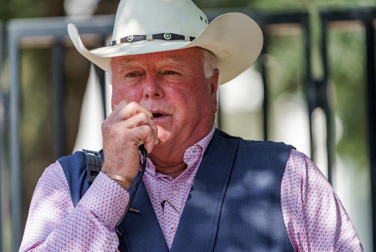 Texas Agricultural Commissioner Sid Miller speaks to a crowd gathered in front of the Governor’s Mansion to protest statewide business closures and mask mandates, on Oct. 10, 2020.