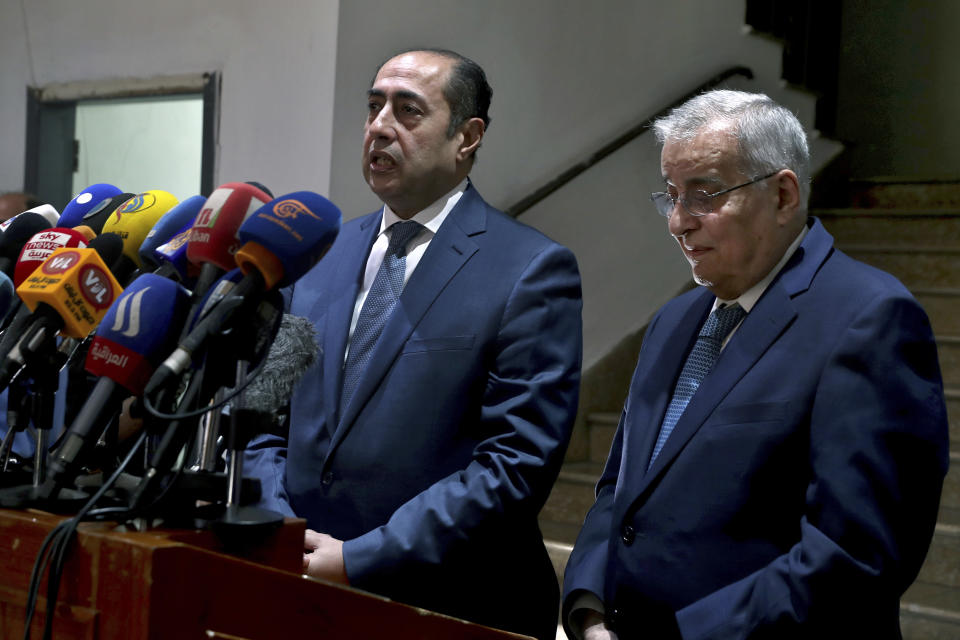 Assistant Secretary General responsible of the League's Council Hossam Zaki, left, speaks during a joint news conference with Lebanese Foreign Minister Abdallah Bouhabib, in Beirut, Lebanon, Monday, Nov. 8, 2021. Zaki is in Beirut to explore ways to resolve an unprecedented diplomatic rift between Lebanon and Saudi Arabia that emerged following comments by Lebanon's information minister on Yemen's civil war. (AP Photo/Bilal Hussein)