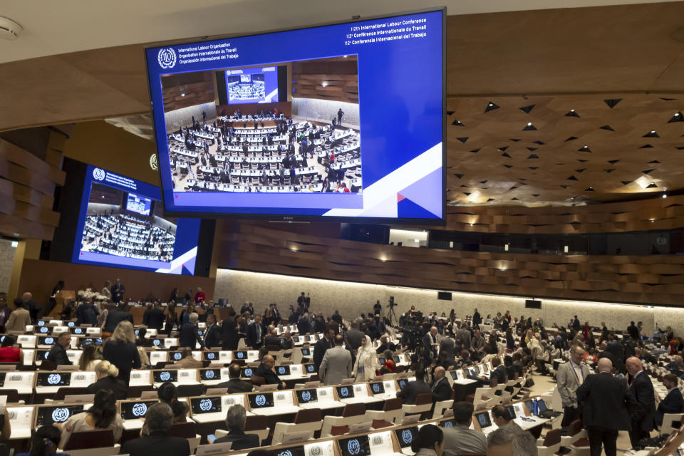 Delegates arrives for the opening of the 112th international Labour Conference - ILO, at the European headquarters of the United Nations in Geneva, Switzerland, Monday, June 3, 2024. (Salvatore Di Nolfi/Keystone via AP)