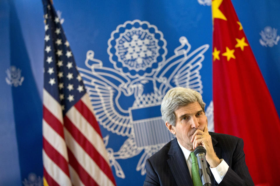 U.S. Secretary of State John Kerry listens to a question during a discussion with Chinese bloggers on a number of issues, including internet freedom, Chinese territorial disputes with Japan, North Korea, and human rights, on Saturday, Feb. 15, 2014, in Beijing, China. (AP Photo/Evan Vucci, Pool)