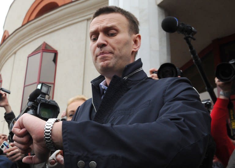 Russian protest leader Alexei Navalny outside court in the provincial city of Kirov on April 17, 2013. The 36-year-old lawyer with bright blue eyes and the confident ability to rally crowds has rattled the Kremlin with his rapid emergence as a tireless anti-corruption campaigner and his openly declared ambition to stand as president