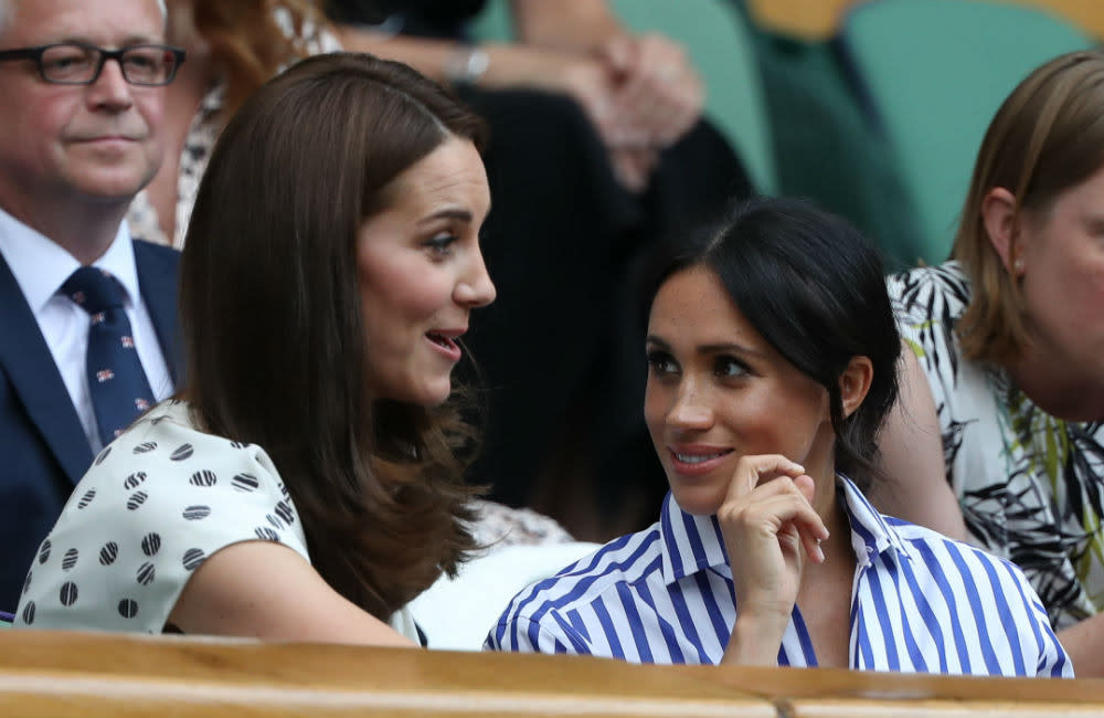 Duchess Catherine and Meghan - at the tennis in London - July 2018 - SPLASH