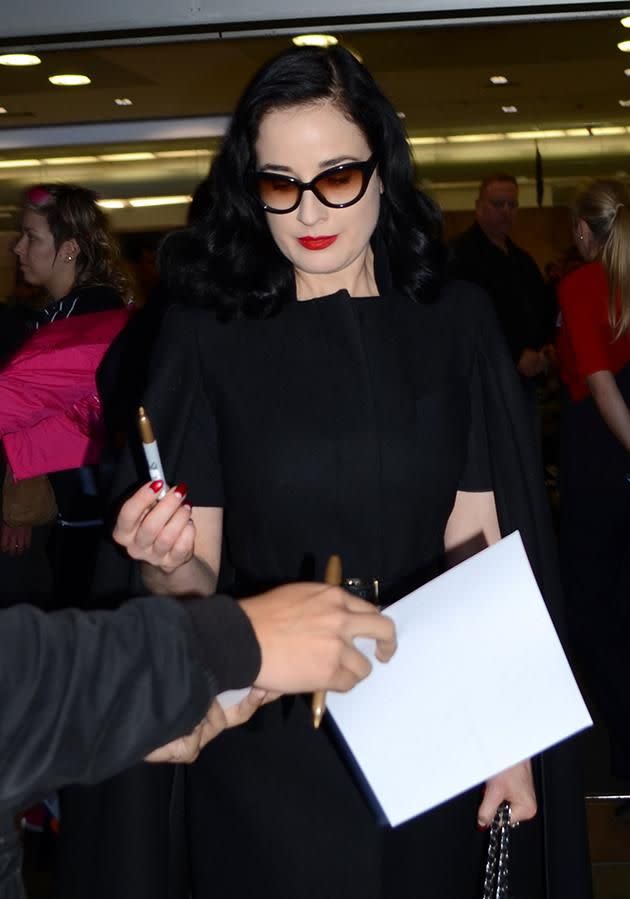 Von Teese is pictured arriving in Sydney ahead of her last show there last night.