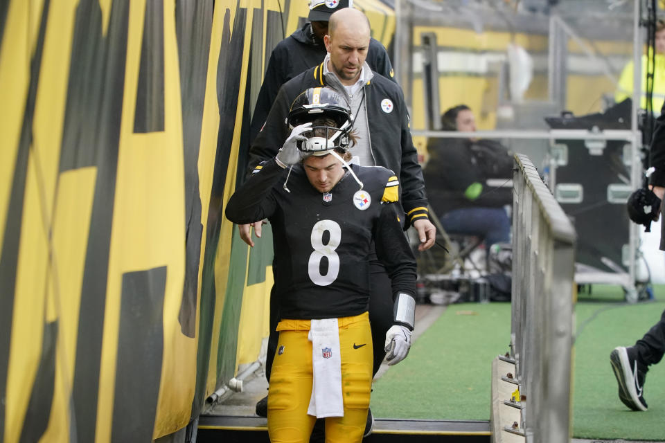 Pittsburgh Steelers quarterback Kenny Pickett walks off the field due to injury during the first half of an NFL football game against the Arizona Cardinals, Sunday, Dec. 3, 2023, in Pittsburgh. (AP Photo/Gene J. Puskar)