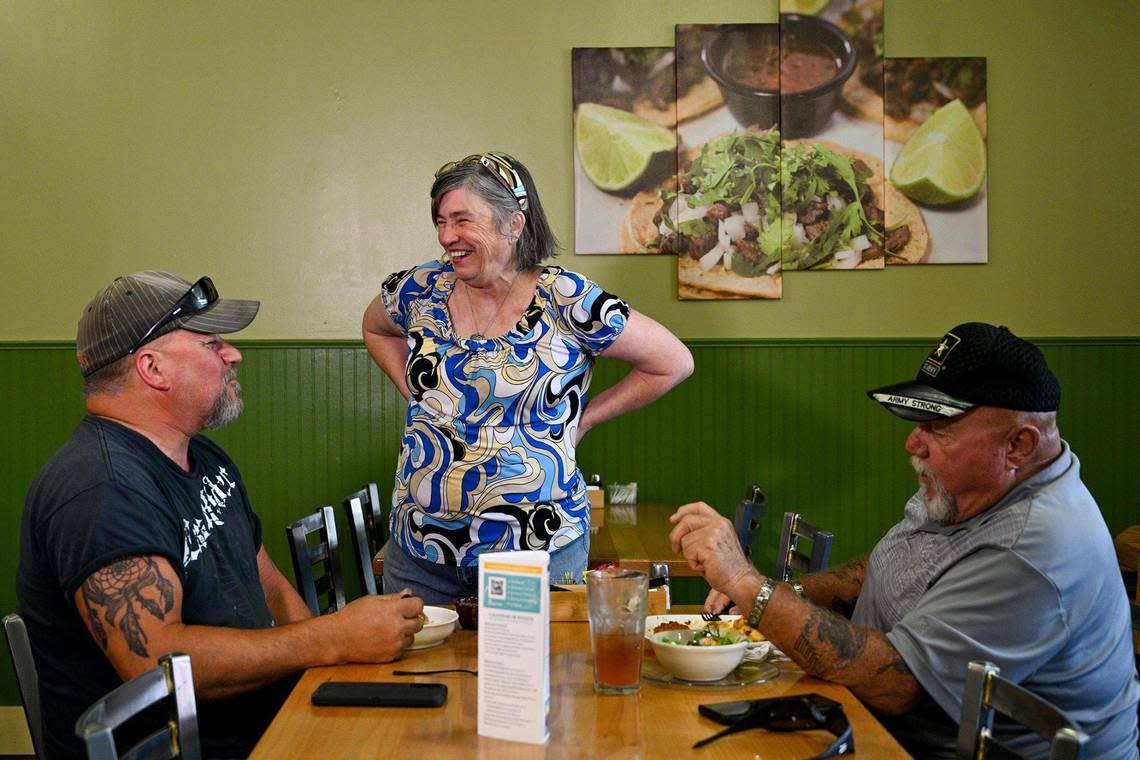 Deb Niedermeyer chats with customers at Frankie’s, the restaurant her son and daughter-in-law opened after moving to Lincoln from Montana. Niedermeyer helps out at the restaurant and manages some rental properties in town, and recently bought a home there.