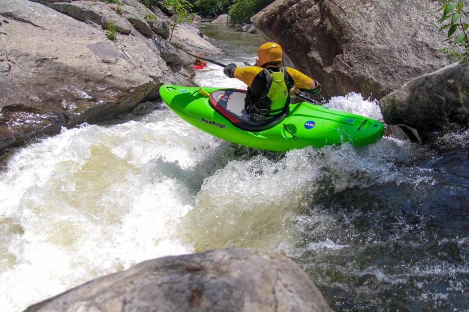 Alex Harvey kayaks in the Green River.